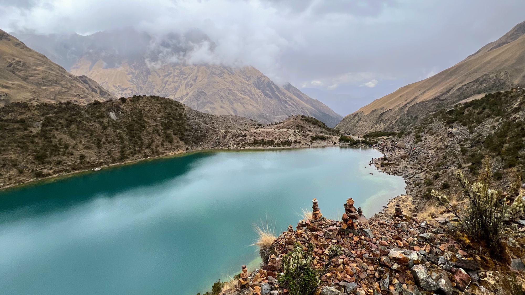 A glacial lake below the Andes at midday, Peru