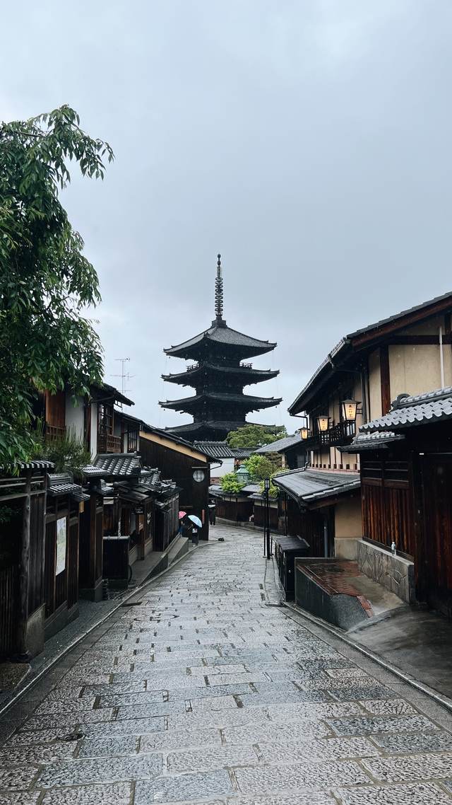 Yasaka Pagoda above wet stone streets in Higashiyama