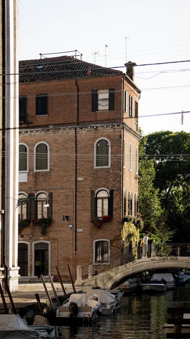 Brick palazzo on a quiet Venetian canal