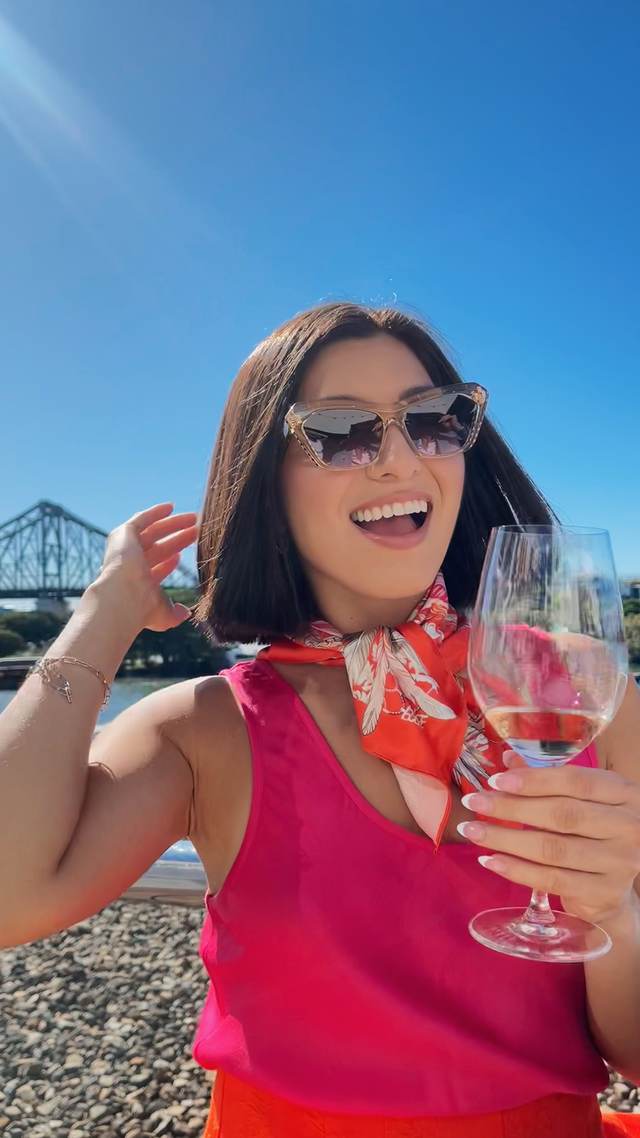 Raising a spritz in front of the Story Bridge in Brisbane